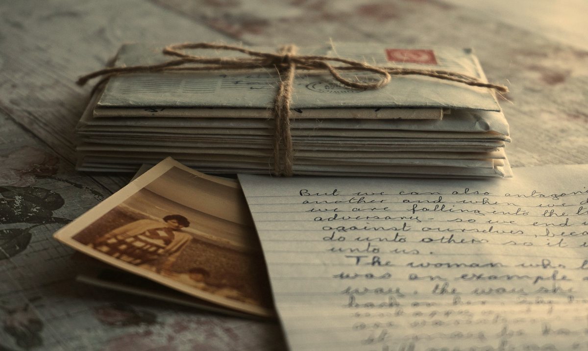 A bundle of old handwritten letters tied with string